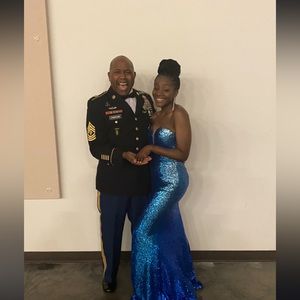 The dress has been worn once. It is a size 4.The dress is in good condition.